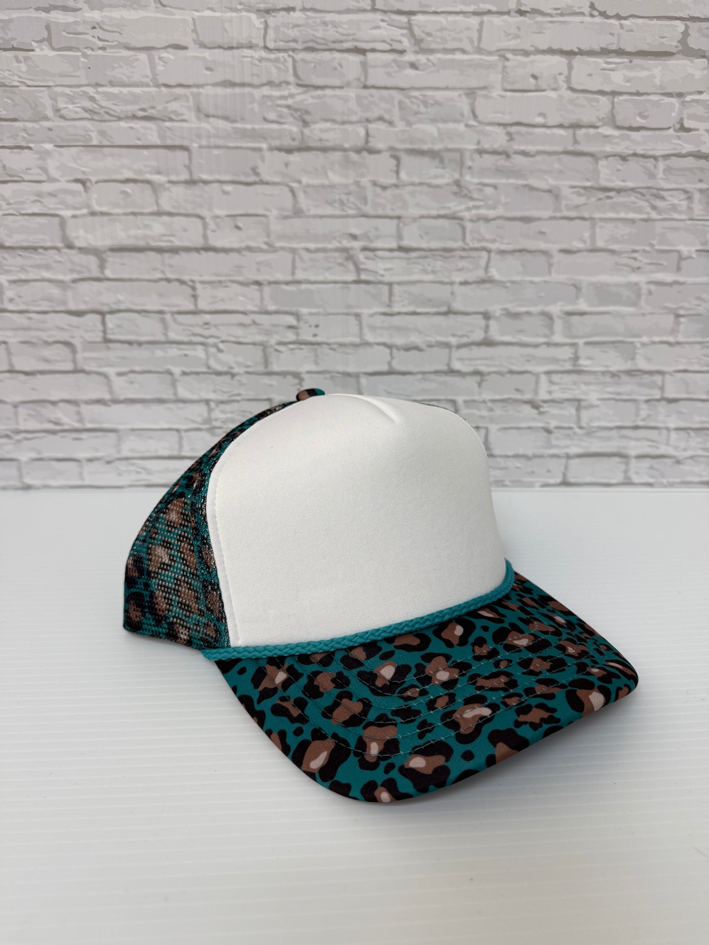 White/Teal Cheetah Pattern Hats